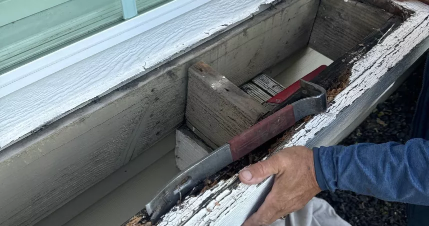 Part of home’s exterior prepared for new siding installation