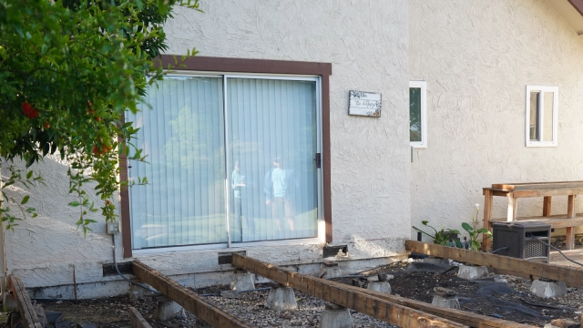 Moisture-damaged deck boards on an Elk Grove home