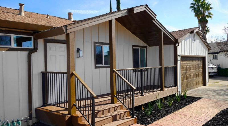 Modern residential homes with matching exterior designs in a planned neighborhood