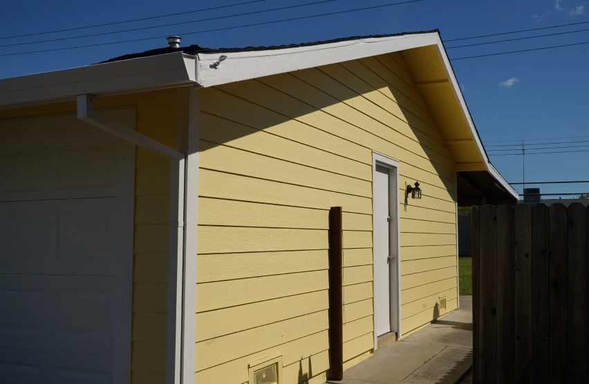New siding installation on a residential home exterior