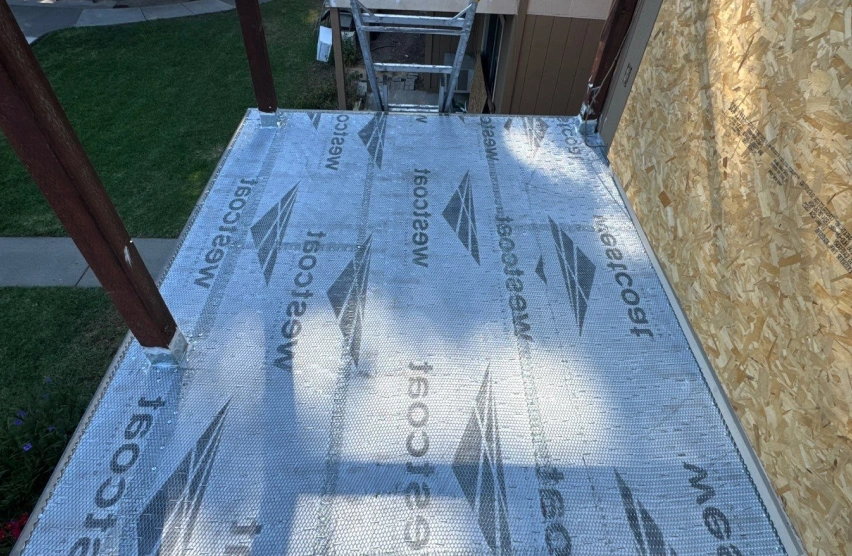 Waterproof Decks Waterproofed deck surface and stairs with sealed transitions to prevent moisture damage