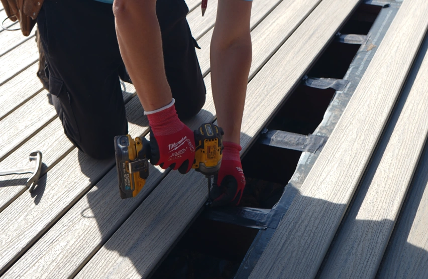 Wood Decks Pressure-treated wood deck under construction with visible framing