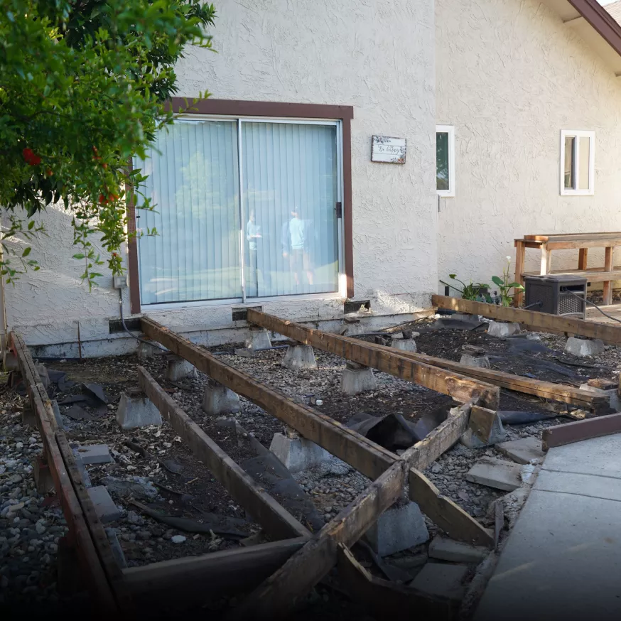 Patio area before backyard renovation.