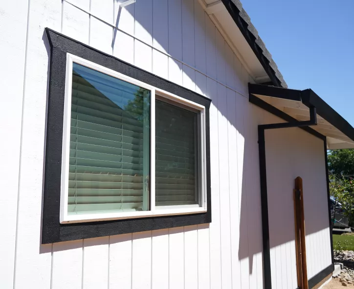 Finished home after full exterior renovation with new siding and paint