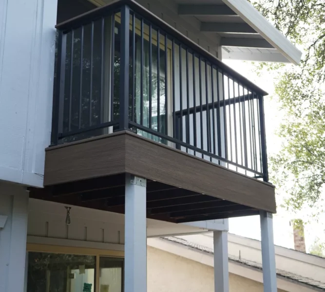 New Trex composite boards installed across expanded deck