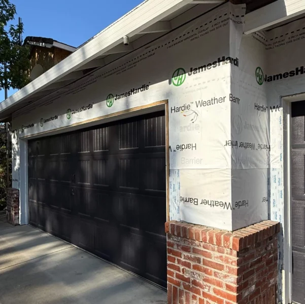 Exterior repairs completed before new siding installation