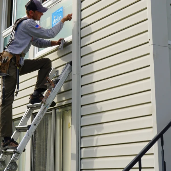 New siding installed before painting begins