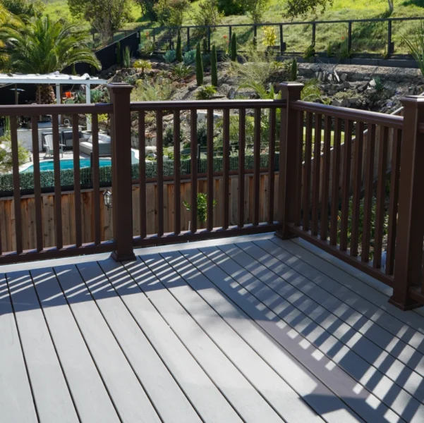 Newly installed Trex composite deck in Honey Grove color nearing project completion
