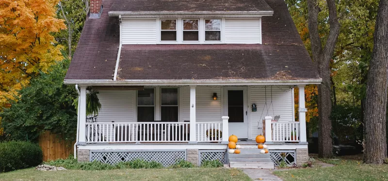 Post-war single-family home in North Highlands with an aging deck