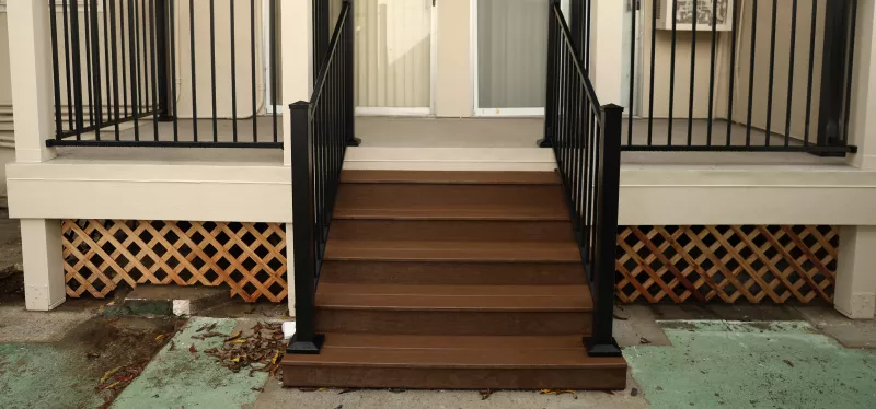 Waterproof membrane installation on an elevated residential deck surface