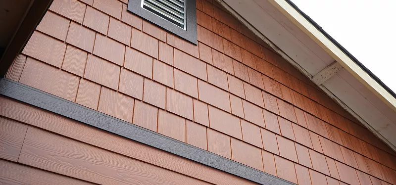 Engineered wood siding with a natural wood-grain finish on a home