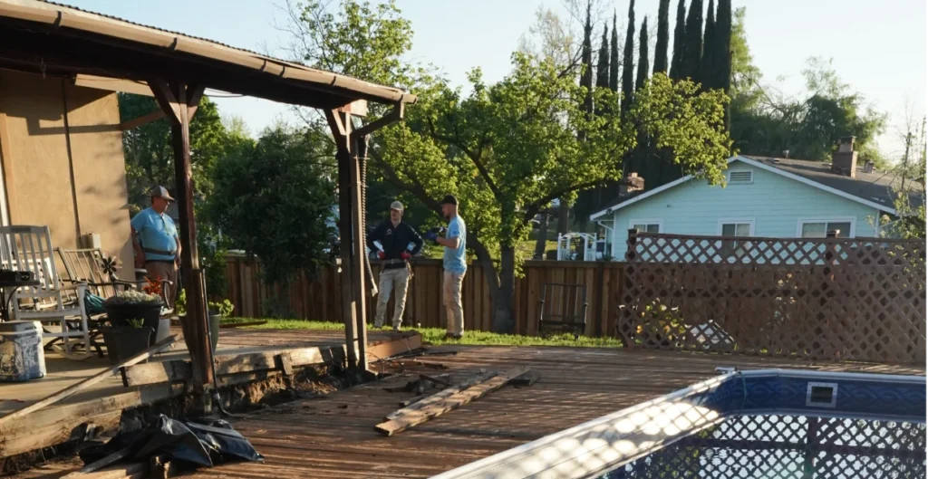  Contractor reviewing backyard deck condition during on-site estimate in Citrus Heights