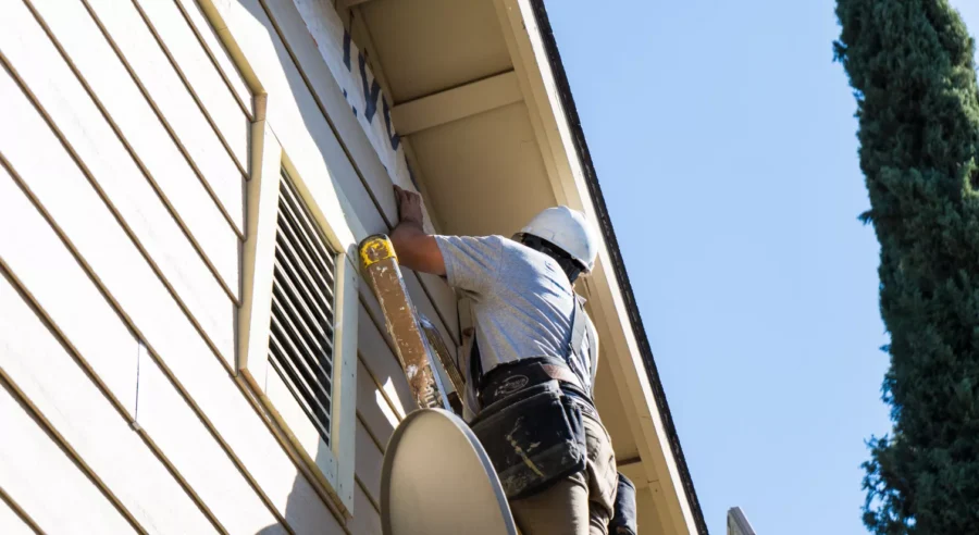 Old siding being removed from Foresthill house.