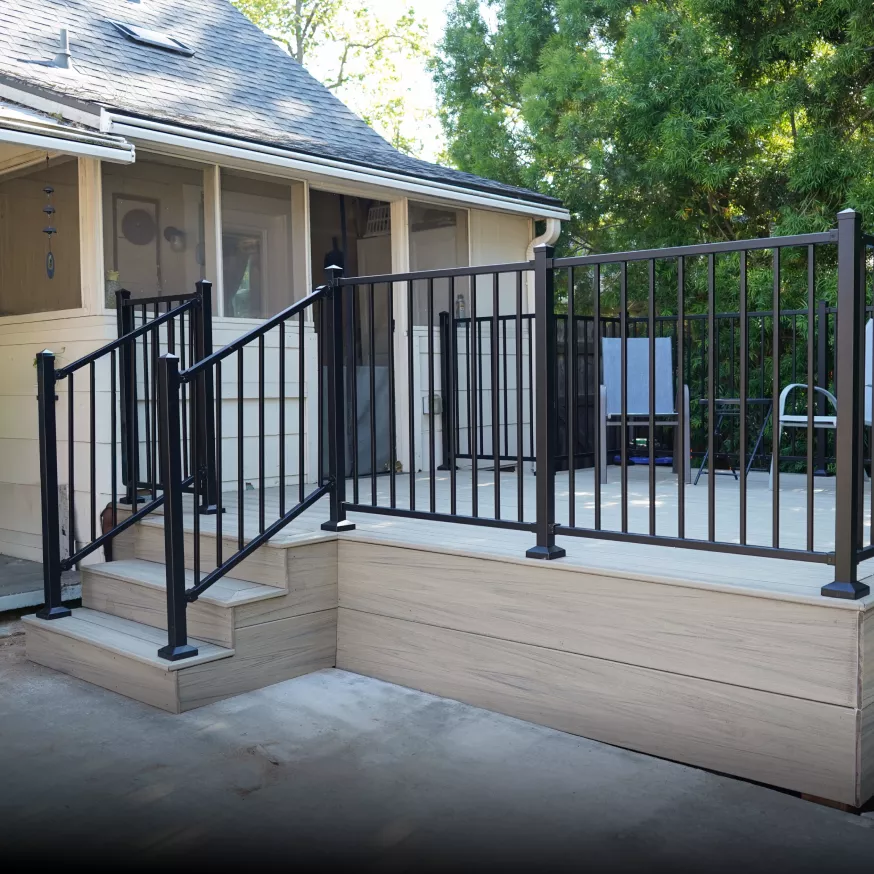 Completed Trex composite deck installation in Honey Grove color