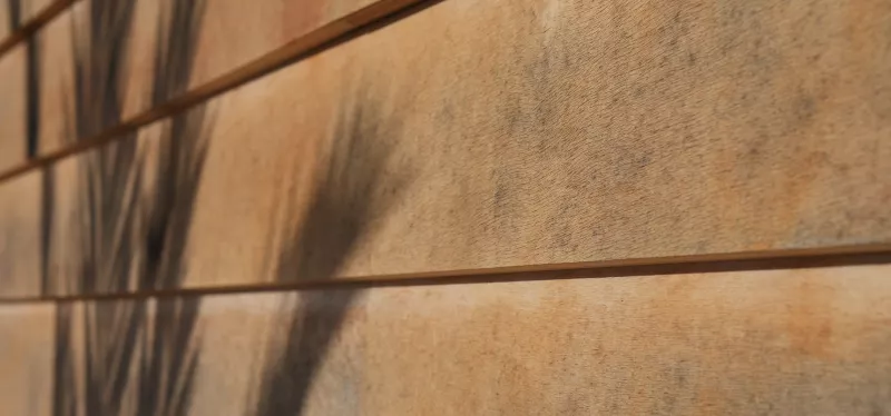 Icon representing durable fiber cement siding installation for Woodland homes