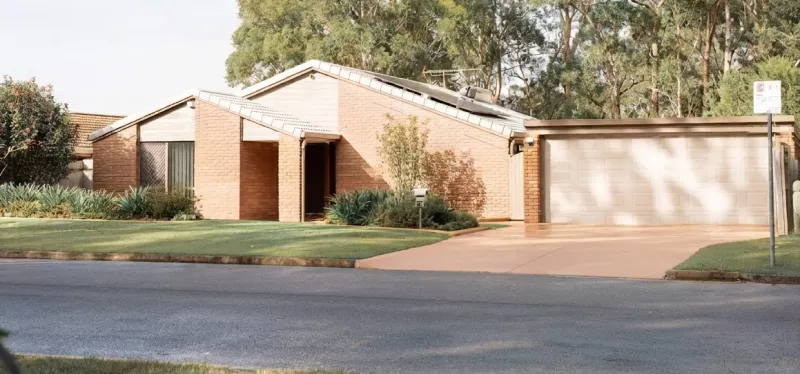 Mid-century modern Streng-built home in Arden-Arcade with original siding.