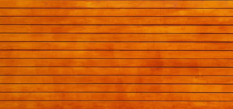 Natural wood siding with clean trim on a residential exterior