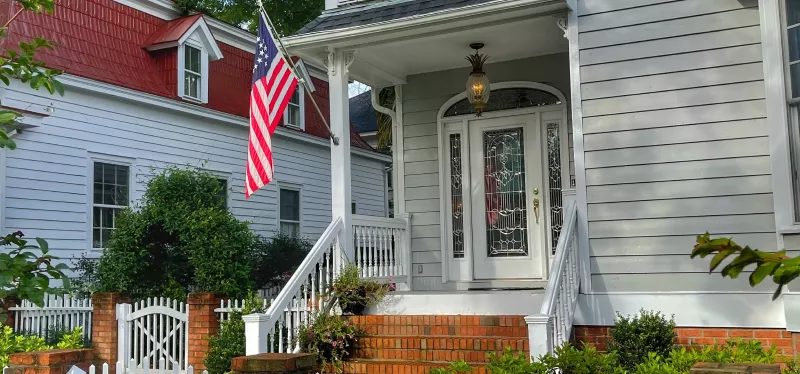 Post-war single-family home in North Highlands with original siding.