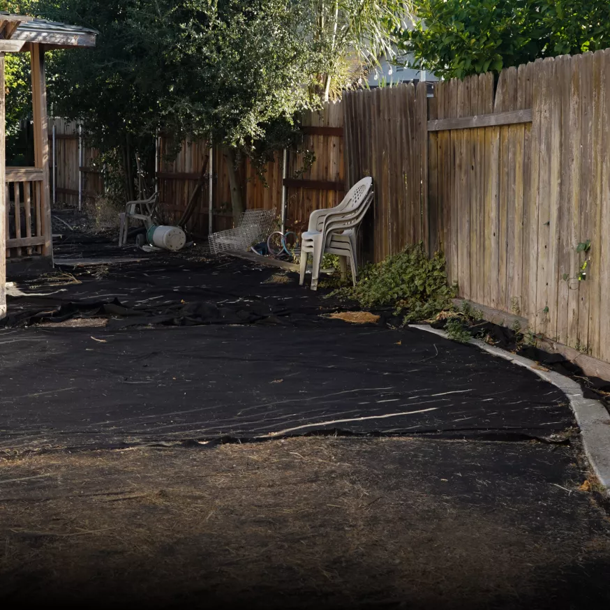 Empty outdoor area before new Trex composite deck construction in Sacramento, CA.