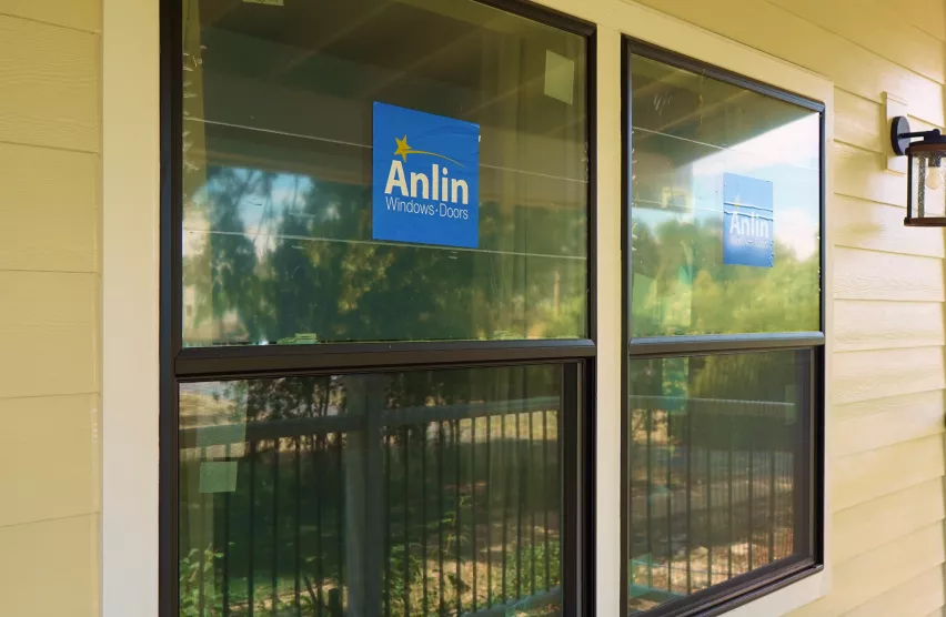 New Anlin replacement windows installed on a Roseville home porch wall
