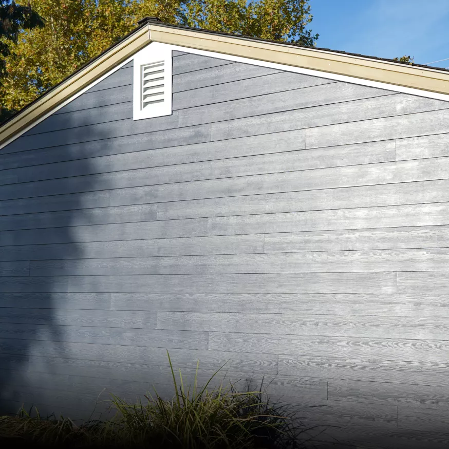 Fair Oaks home with finished blue James Hardie ColorPlus fiber cement siding.