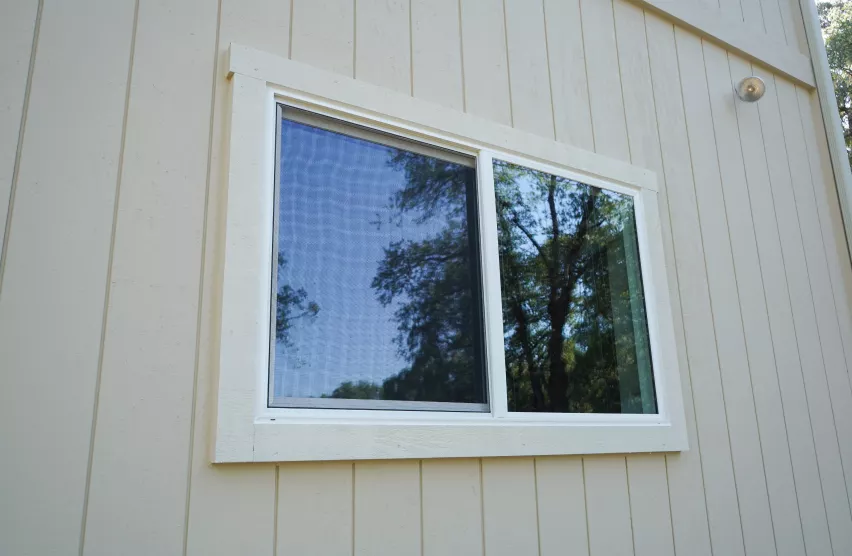 New slider window with fresh trim after full-frame window replacement in Folsom