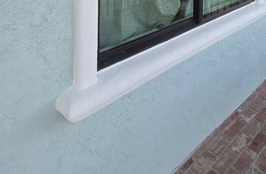 Restored smooth sill and new window frame after replacement on a Rancho Cordova home