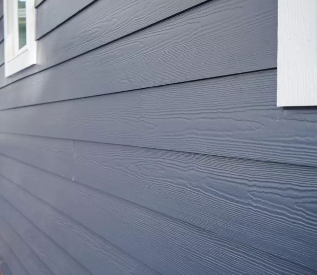 New smooth-texture James Hardie fiber cement siding installed on Fair Oaks residence.