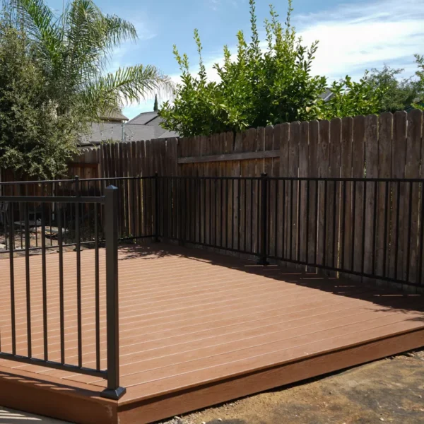 Trex composite decking boards installed on the newly constructed deck frame.