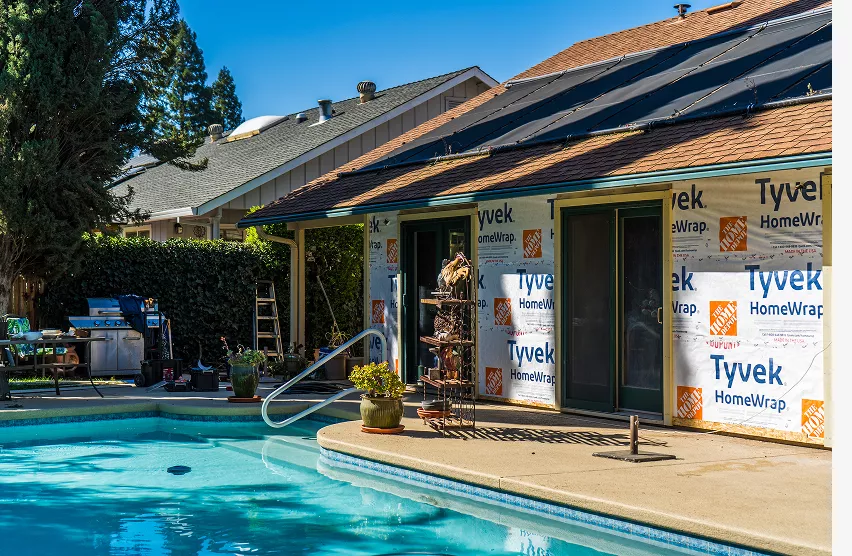Weathered Elk Grove home exterior before siding and trim repair