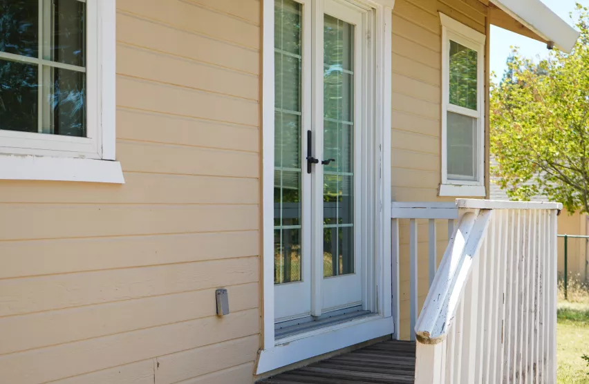 Refreshed windows, patio door, and trim after window replacement in Folsom