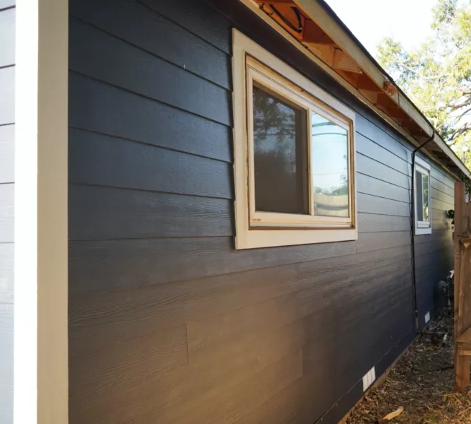 Finished blue James Hardie ColorPlus siding on Fair Oaks home.