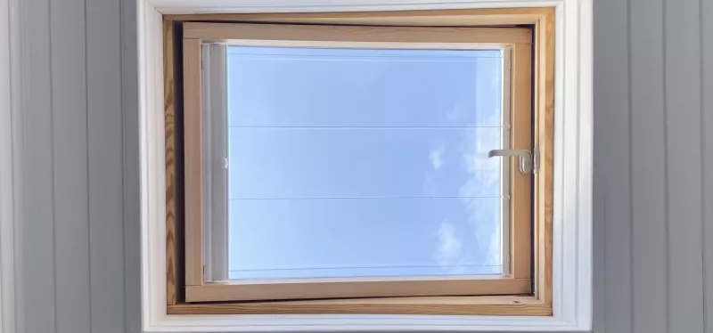 Awning window hinged at the top, opening outward