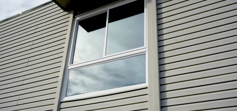Casement window swinging outward on side hinges