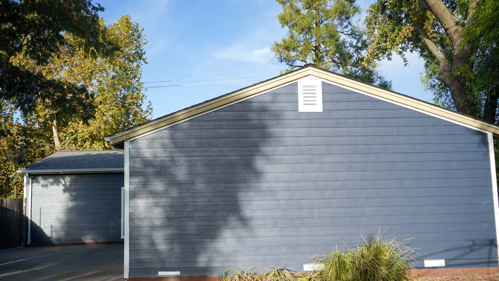 Completed blue James Hardie siding on a Fair Oaks home exterior.
