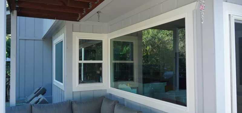 Fixed picture window framing a simple view