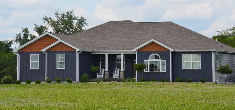 Single-story ranch-style home in Roseville, CA, featuring wide sliding windows and a large front picture window