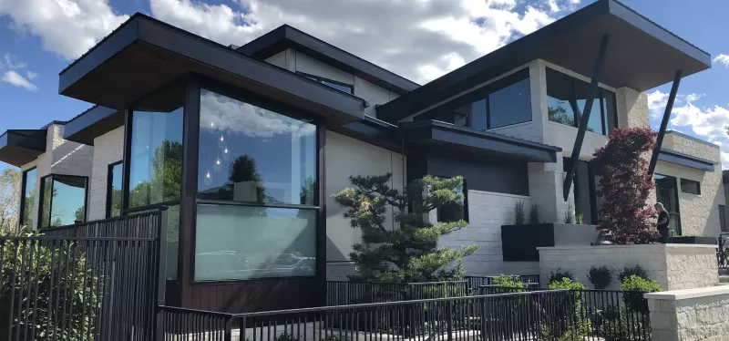 Stucco Home Exterior Repair in Elk Grove Stucco home in Elk Grove with repaired exterior wood trim and accents