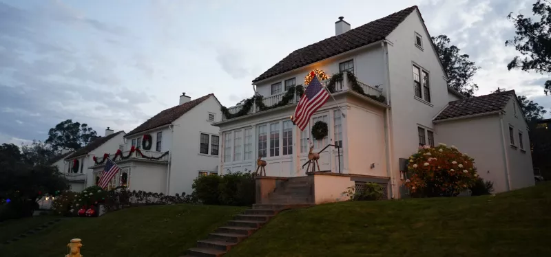 Two-story suburban home in Roseville, CA, with white-framed double-hung and casement replacement windows